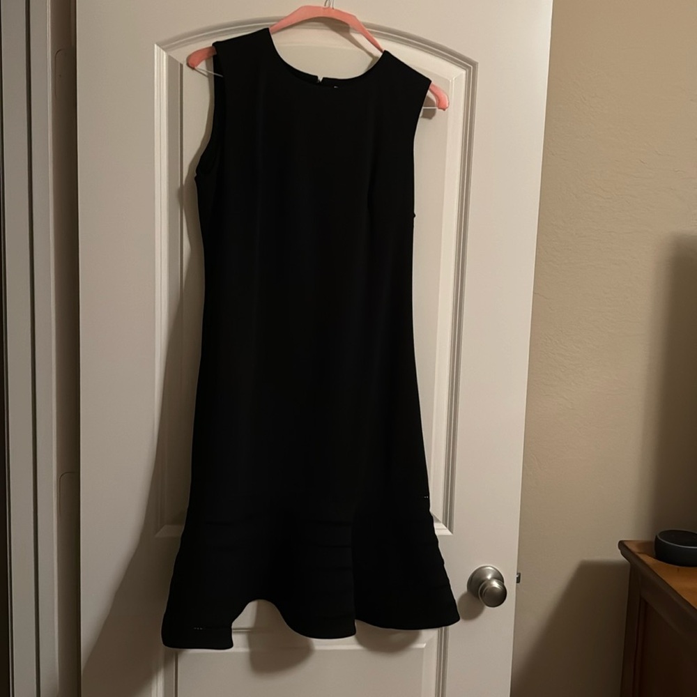 Black Calvin Klein dress worn 1 time. Dress is in very good condition.